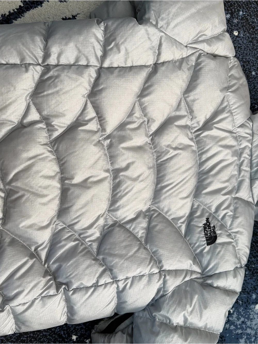 The North Face Kids Black Hooded Puffer Jacket with Light Gray Trim